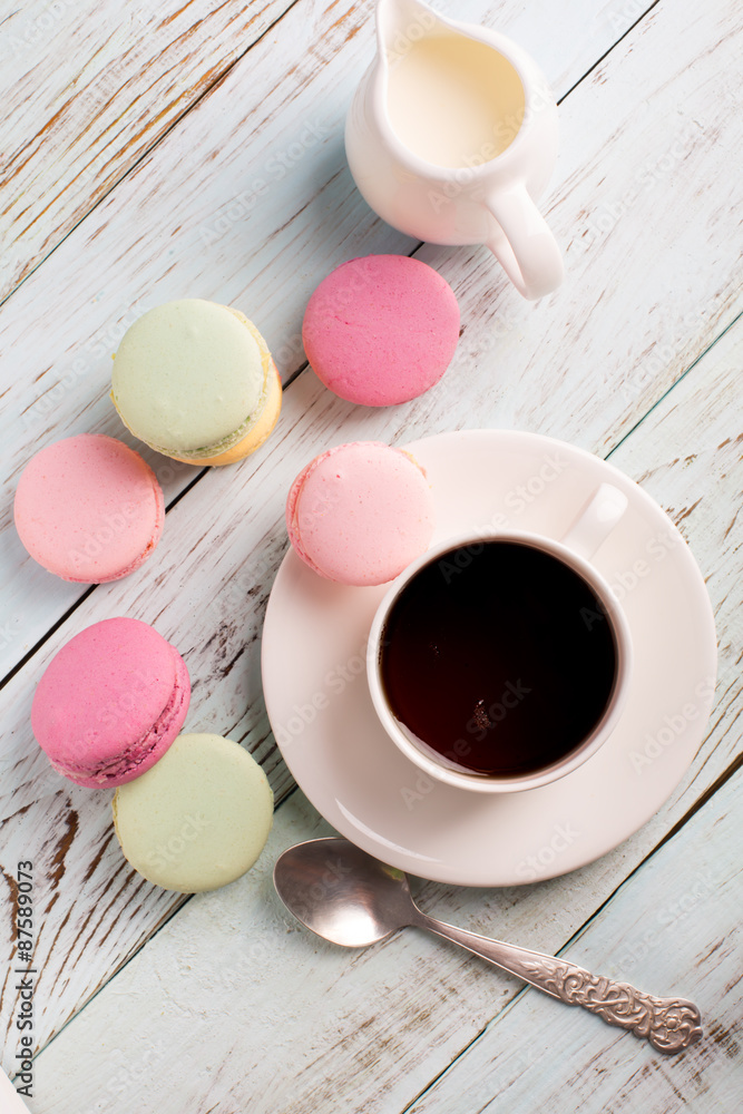 Cup of coffee and macaroons