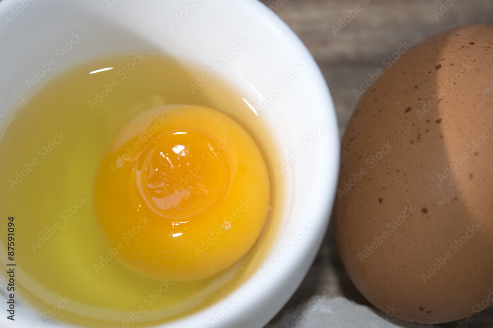 shelled white egg and yolk shelled white egg and yolk