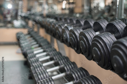 dumbbells on a background of the gym.