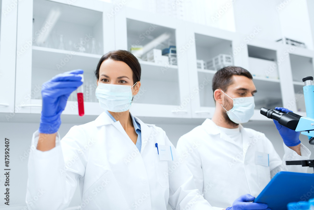 young scientists making test or research in lab