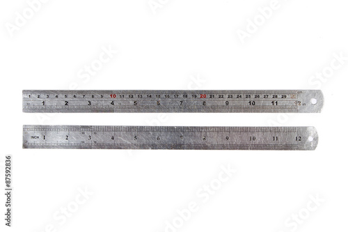 Carpenter's metal ruler isolated on  white