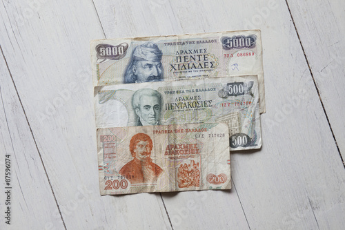 Greek drachma on the table photo