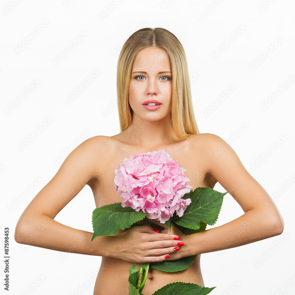 Beautiful model posing with pink flower, isolated on white background