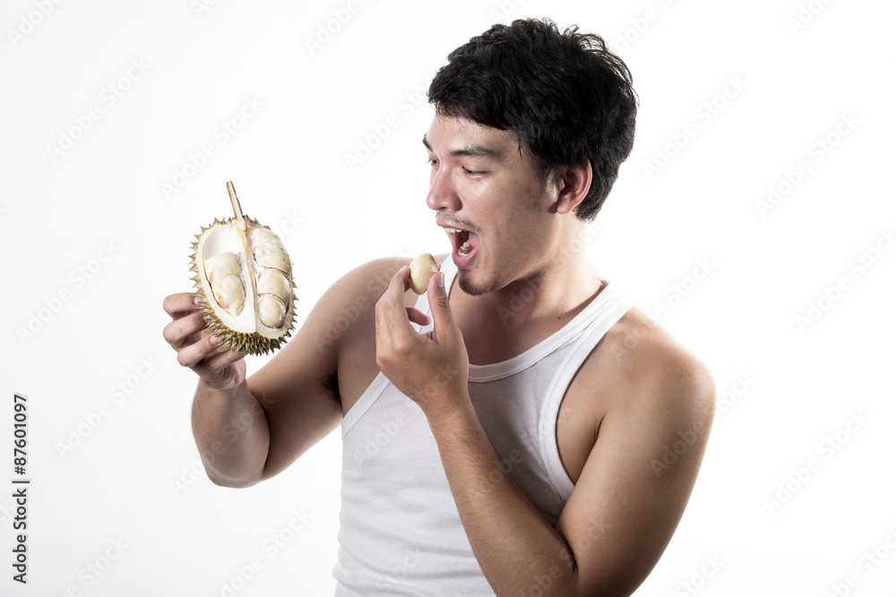 Asian man eating Durian