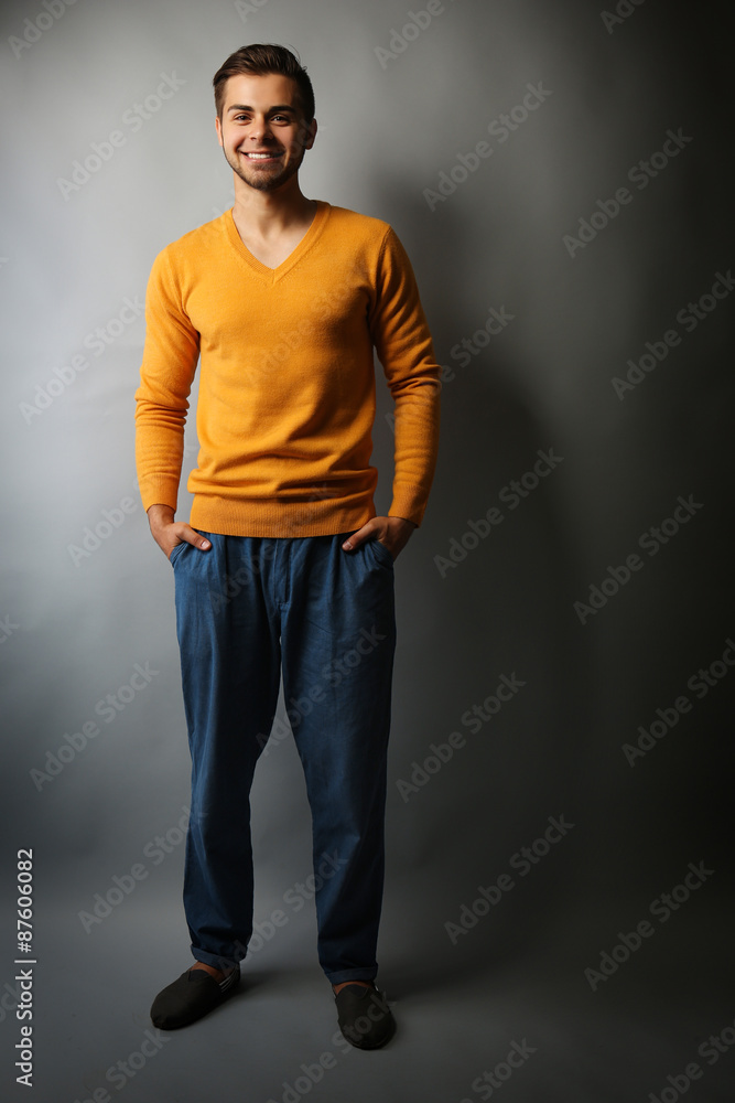 Handsome man on gray background Handsome man on gray background