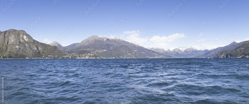 Lake of Como with snow-capped mountains.