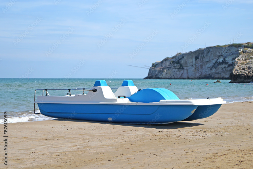 Fototapeta premium pedal boats on the beach