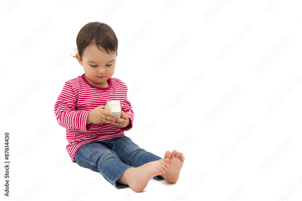 Little cute girl holding a gift box, isolated on the white background Little cute girl holding a gift box, isolated on the white background