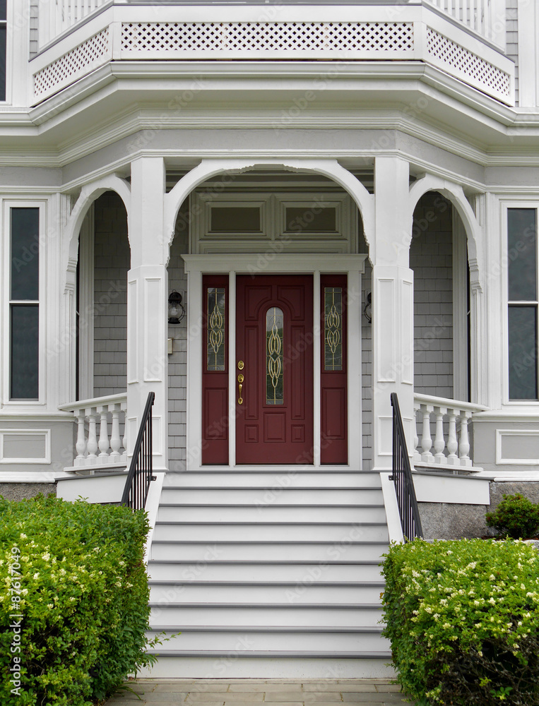 white wooden porch and front steps of house