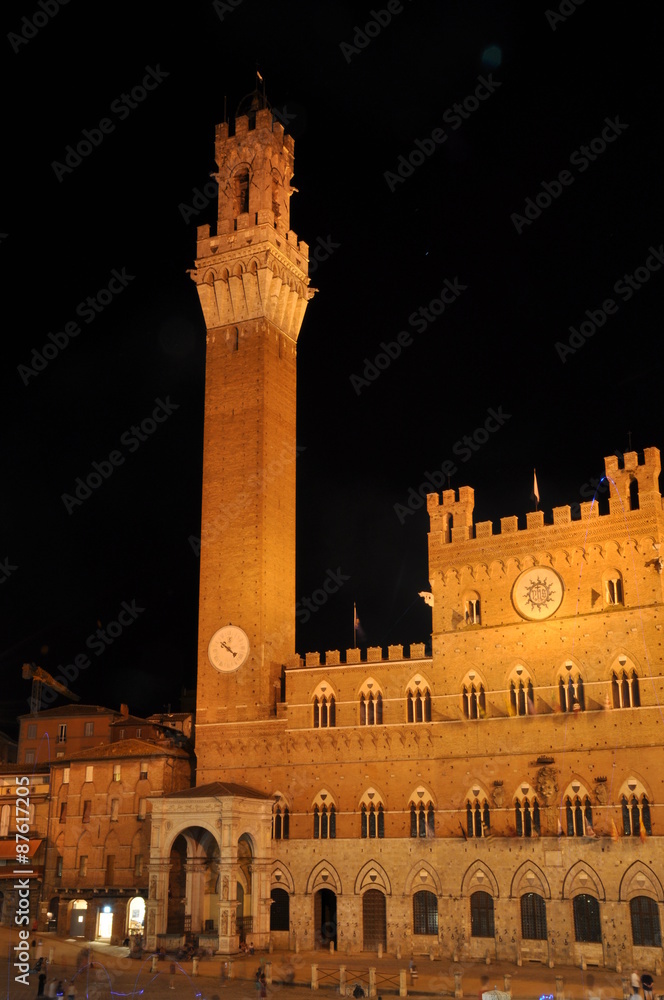 Night photo. Torre del Mangia tower, Siena, Tuscany, Italy