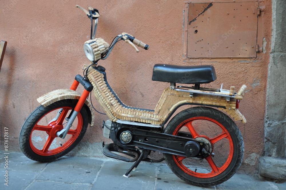 Old scooter on the street Italian town