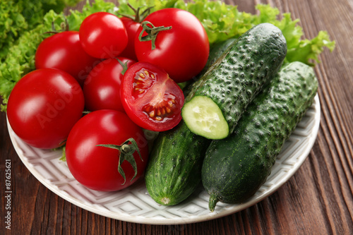 Fresh vegetables on wooden table, closeup