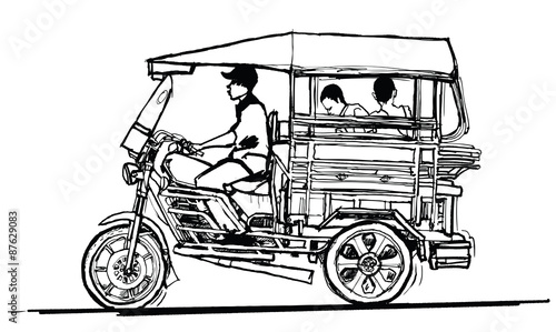 Driving tuk tuk in Laos