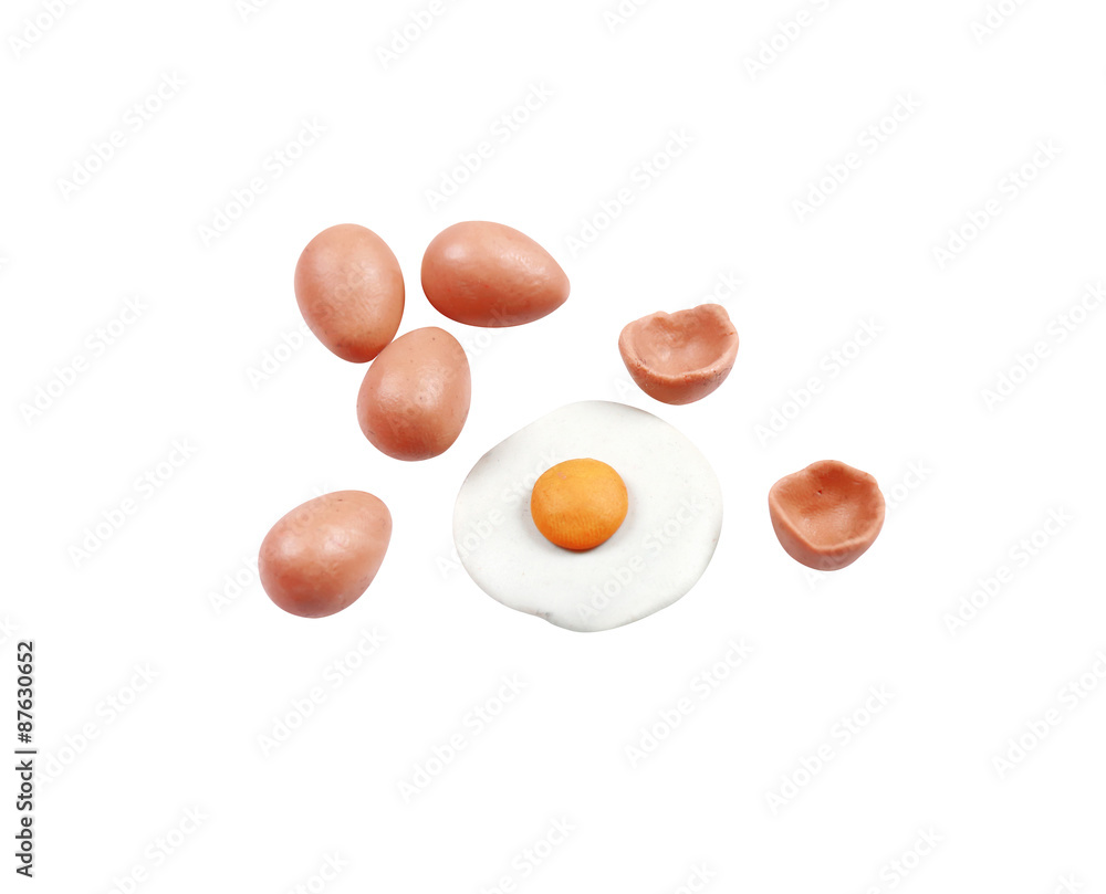 miniature egg fried model from japanese clay on white background miniature egg fried model from japanese clay on white background