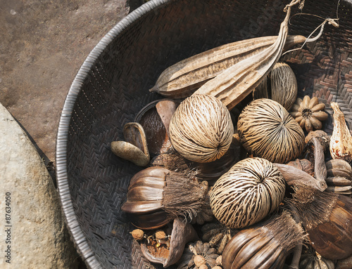 Dried Othalanga and plants ornament in wooden bowl Abstract Form