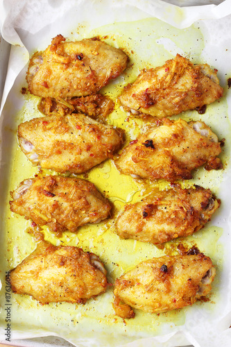 chicken wings roasted with turmeric and herbs