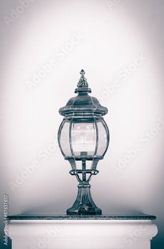 Vintage lamp on table 