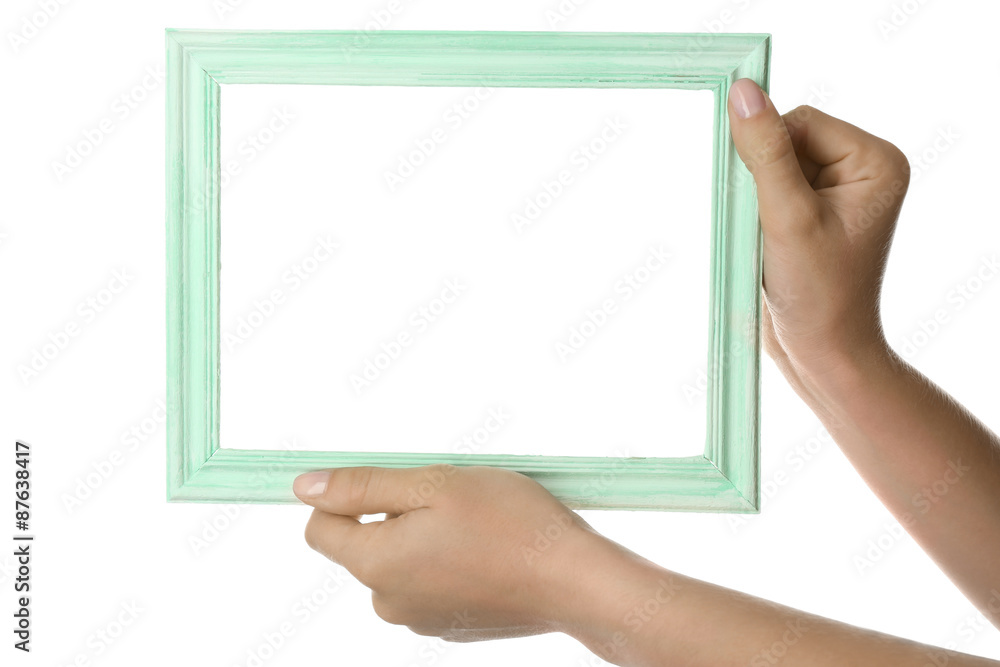 Female hands with wooden frame, isolated on white Female hands with wooden frame, isolated on white