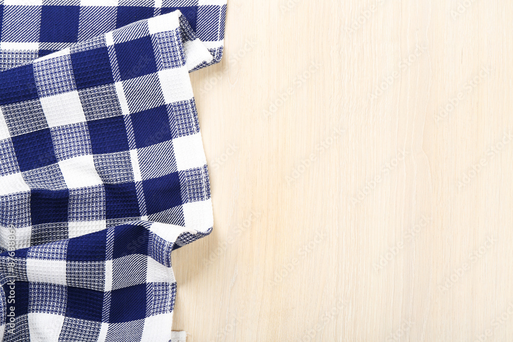 Fototapeta premium Napkin on wooden background