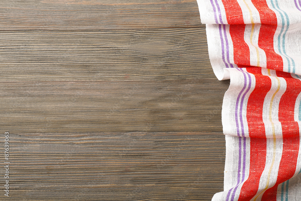 Fototapeta premium Napkin on wooden background