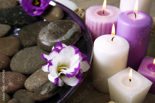 Spa still life with bowl of water for pedicure procedure