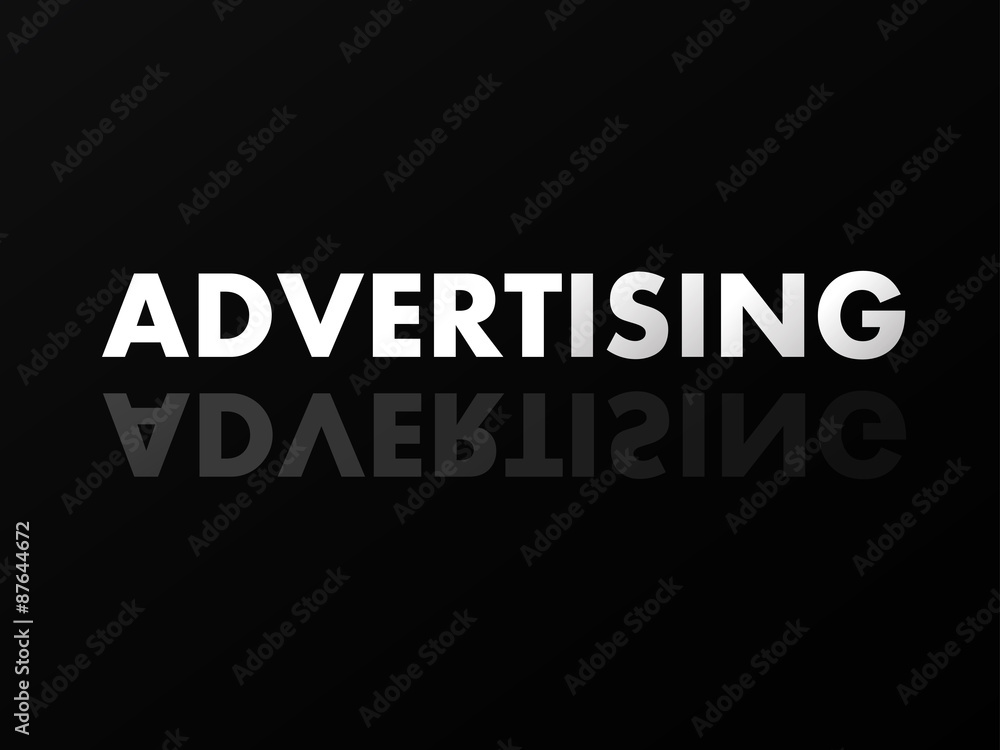 The word ADVERTISING in mirror reflection on black background.