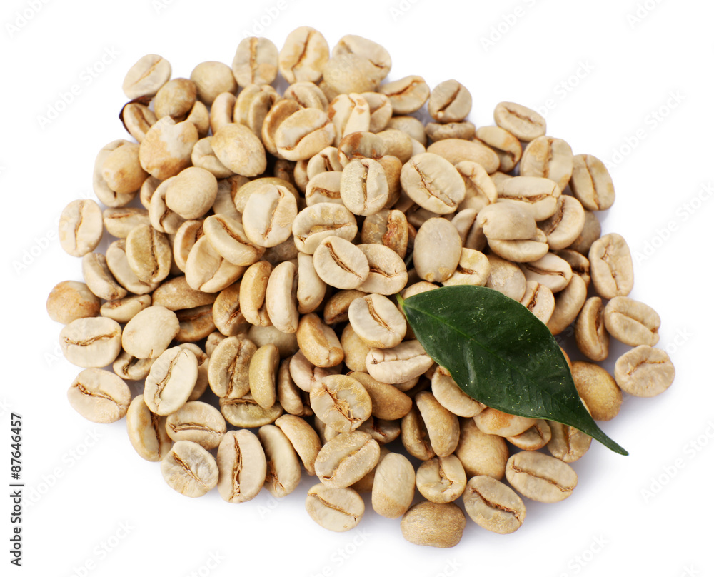 Heap of green coffee beans with leaf isolated on white Heap of green coffee beans with leaf isolated on white