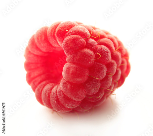 Fresh red raspberry isolated on white