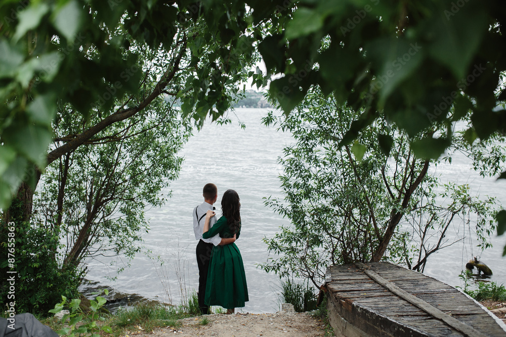 Fototapeta premium man and woman at the lake