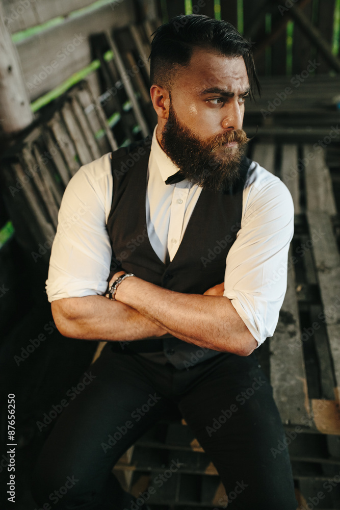 man in a hangar with subdued light man in a hangar with subdued light