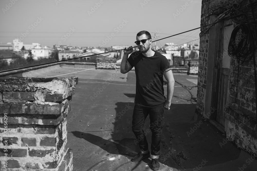 Fototapeta premium Confident man posing in selvedge jeans