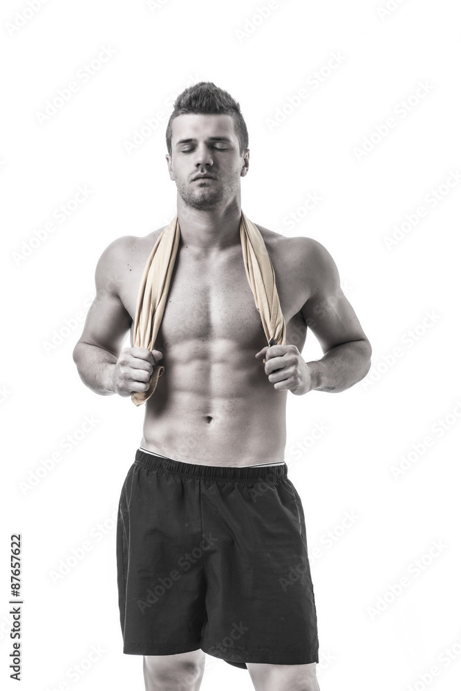 Fototapeta premium Handsome young bodybuilder in relaxed pose