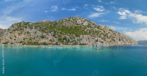 panoramic view of blue lagoon and rocky island