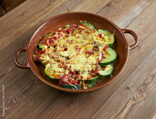 zucchini with cheese and tomatoes