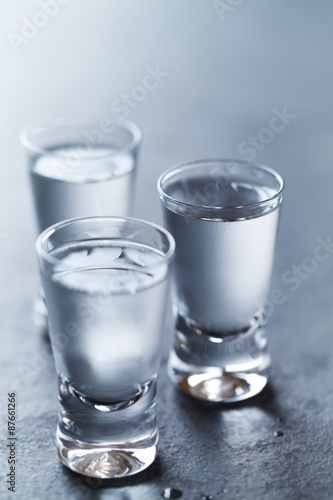 Shot glasses of cold vodka 