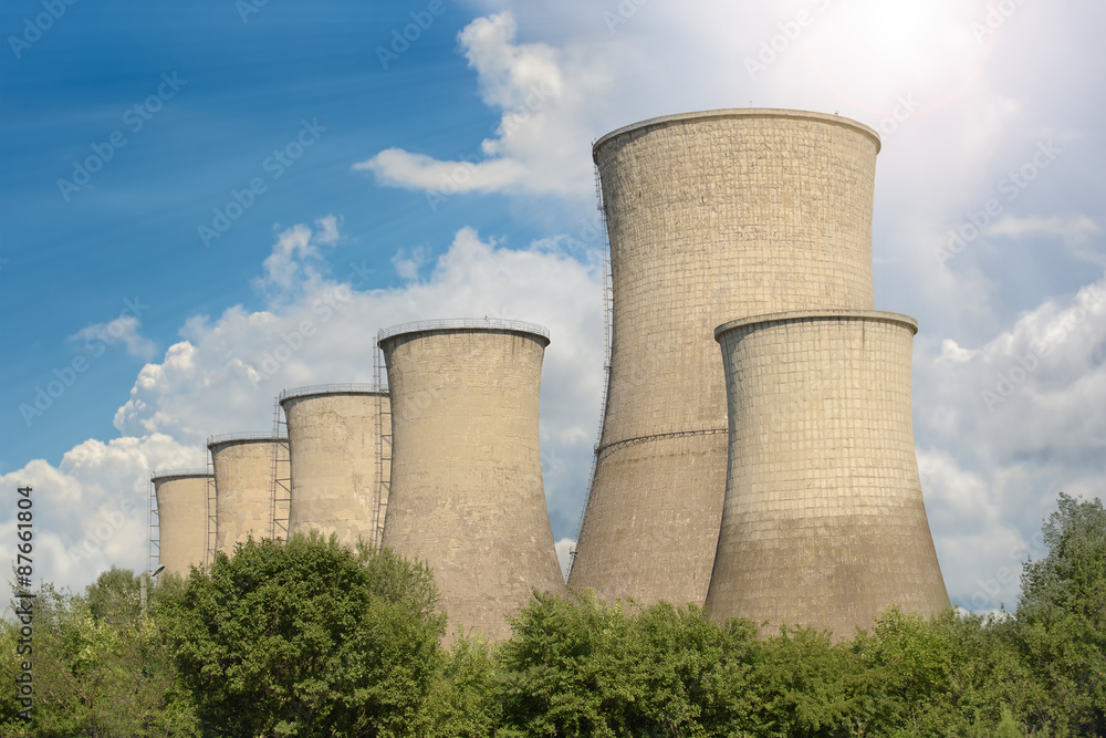 Industrial towers against summer sky Industrial towers against summer sky