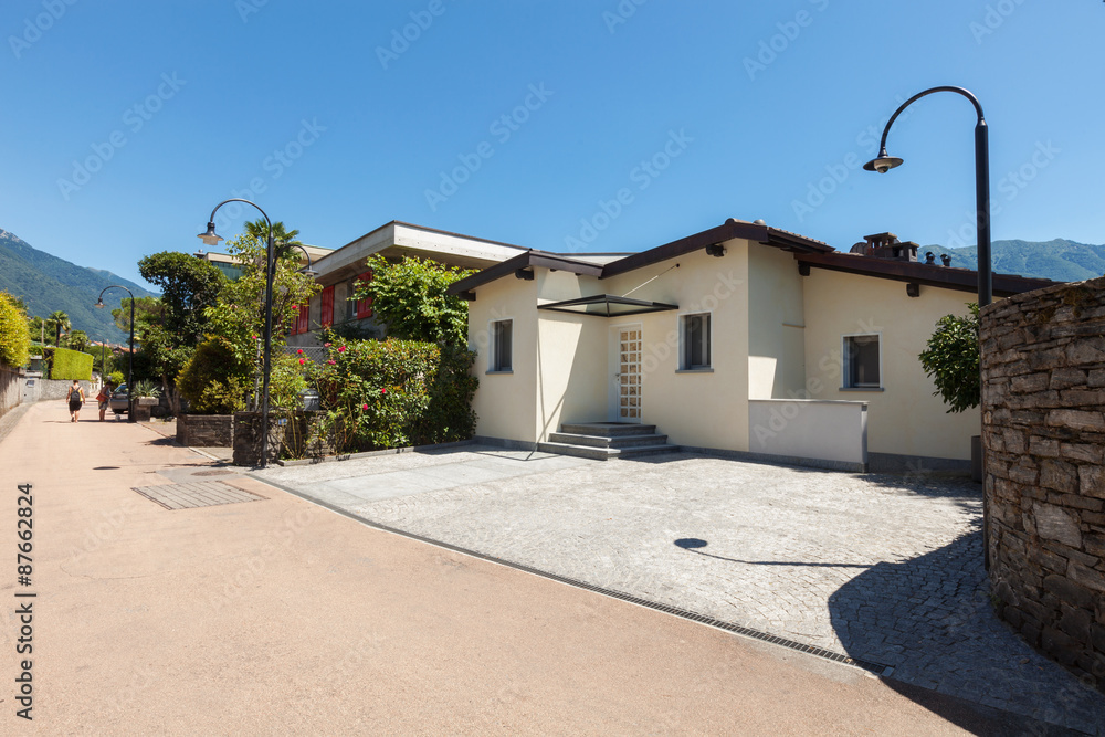 Fototapeta premium Modern house, view from the entrance on the road