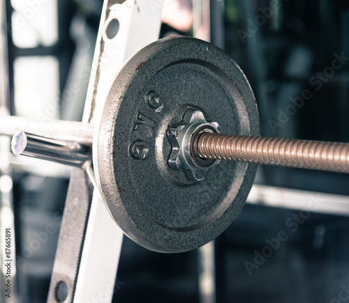 Barbell closeup on 5 kg plate