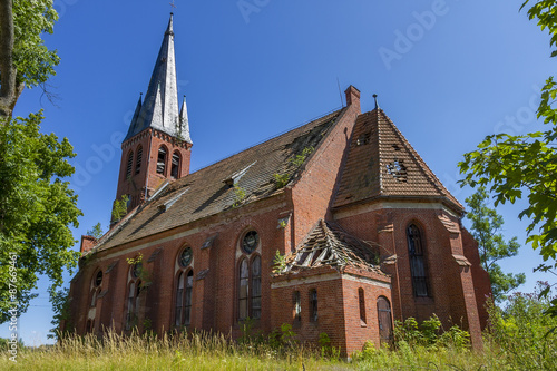 Abandoned Christian church of red brick