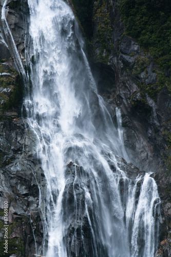 Waterfall at milford sound, New Zealand