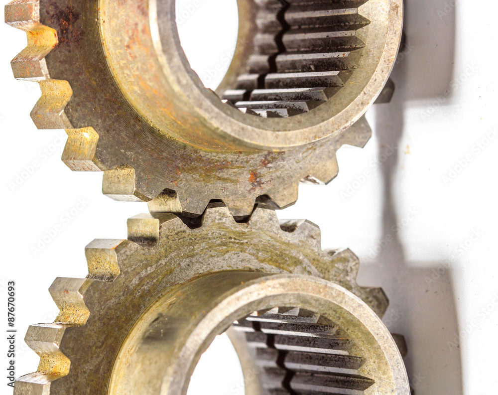 Two gears meshing together closeup Two gears meshing together closeup