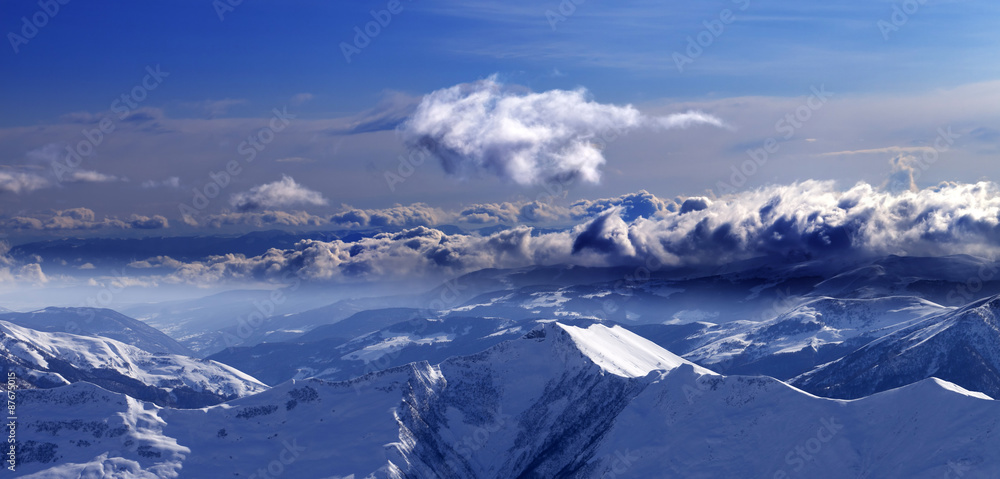 Panoramic view of mountains at evening and sunlight clouds