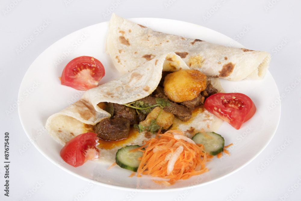 Mutton Curry on Roti with Carrot, Cucumber and Tomato Sambal Mutton Curry on Roti with Carrot, Cucumber and Tomato Sambal