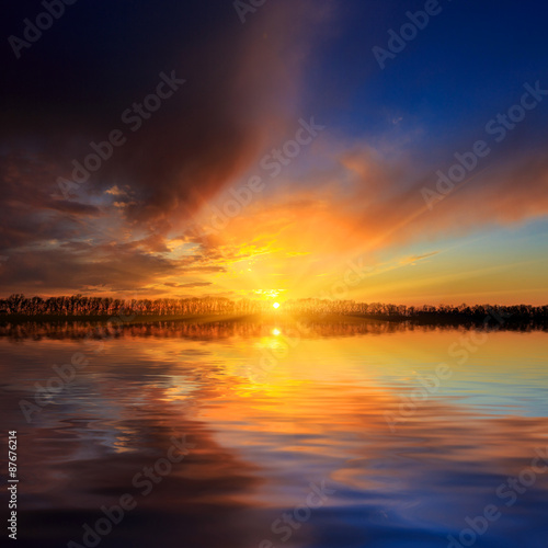 sunset scene over lake water surface
