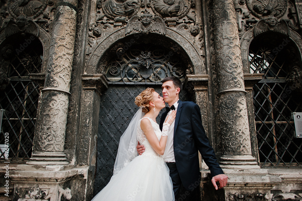newlyweds background old black stone oratory newlyweds background old black stone oratory