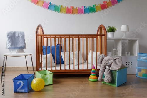 Toys in modern baby bedroom photo