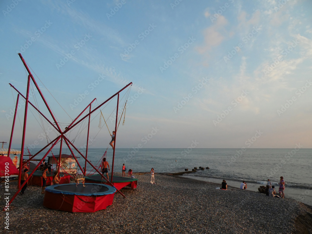 Entertainment on the beach, summer evening at the Black Sea