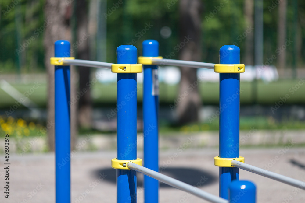 parallel bars.photo close-up on the exercise equipment in the pa