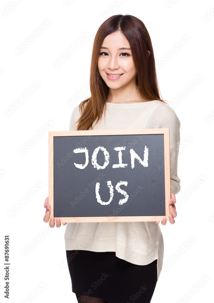 Woman hold with chalkboard showing a phrase of join us Woman hold with chalkboard showing a phrase of join us