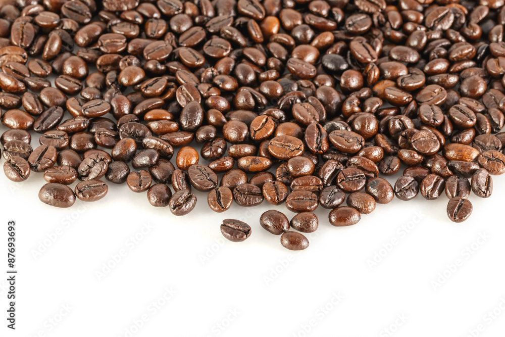 Naklejka premium coffee beans on the white background